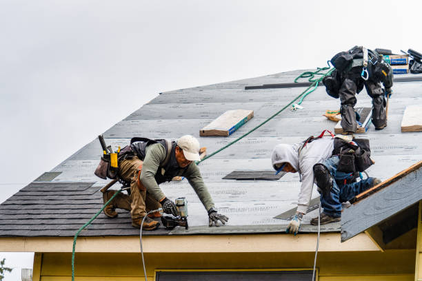 Professional Gutter Installation technician working in Monponsett, MA